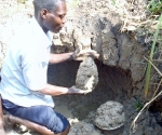 Digging clay from the swamp